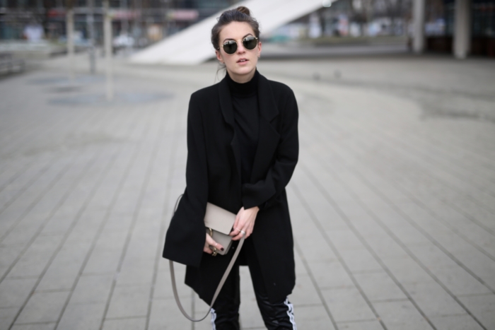 Ray Ban shades, black long blazer, gray purse