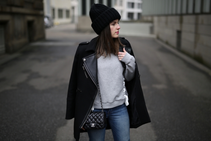 Knitted beanie, grey pullover, black Mango coat, Chanel purse