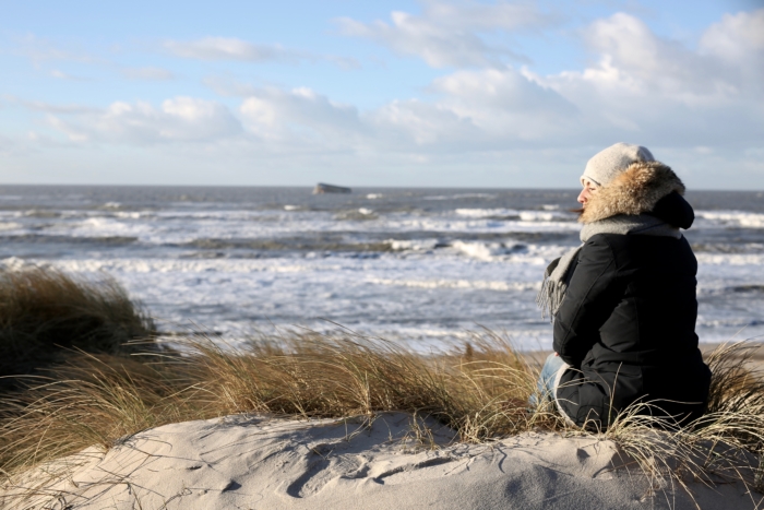 denmark, coast, waves, winter parka, scarf