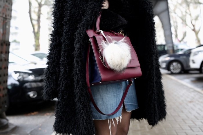 teddy coat, dark red bag, jeans skirt