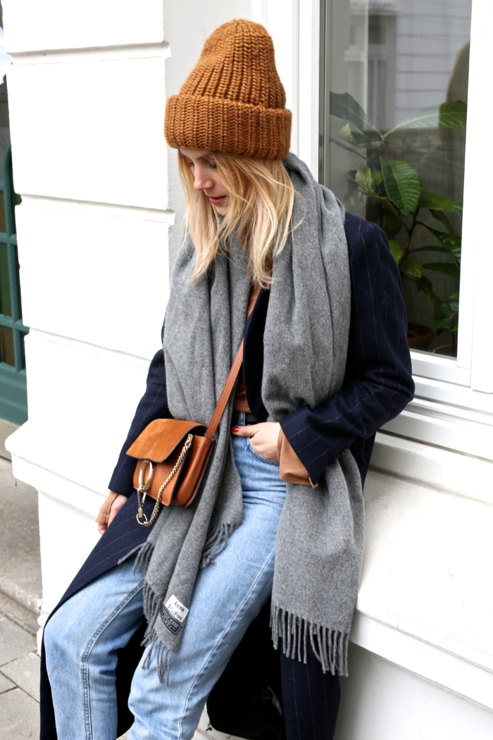 Acne scarf, knitted hat, Cloé bag, jeans, blue coat