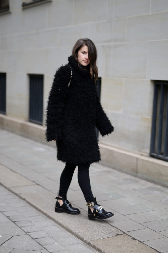 black teddy coat, black pants, Balenciaga boots