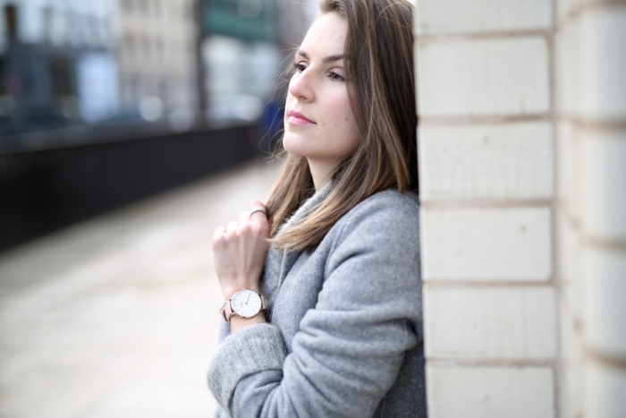 grey coat, cluse watch, short brown hair