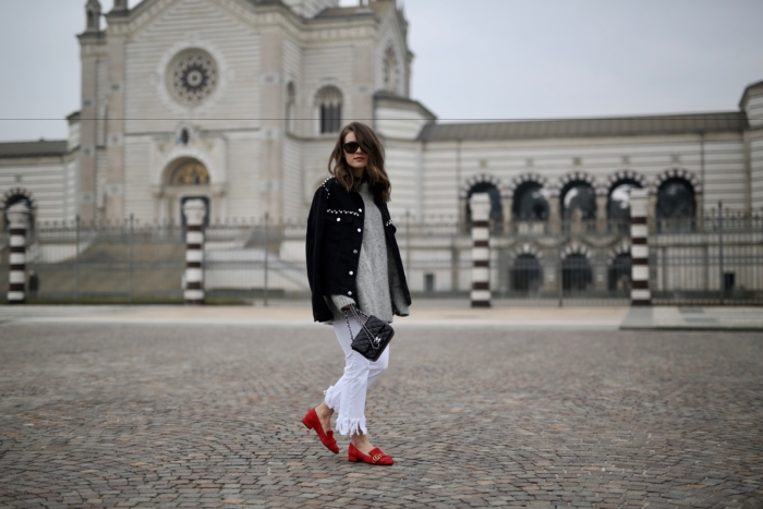 Milan, black jacket, grey sweater, white pants, red Gucci shoes, Chanel purse