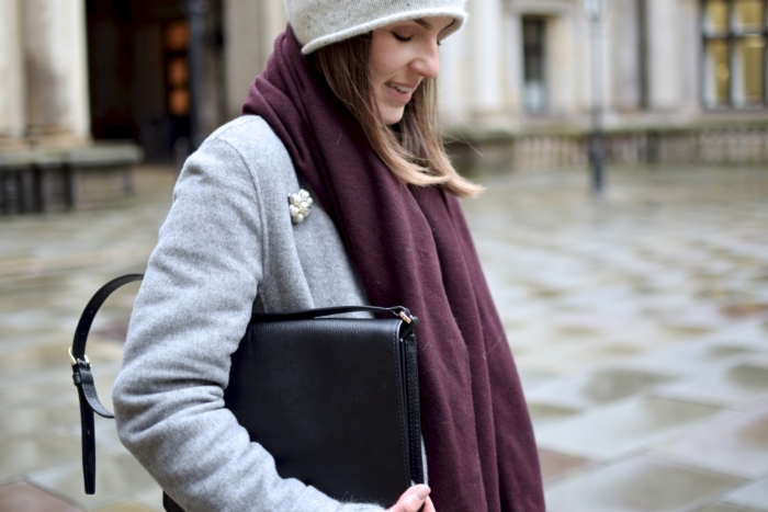 bag, grey coat, dark red scarf