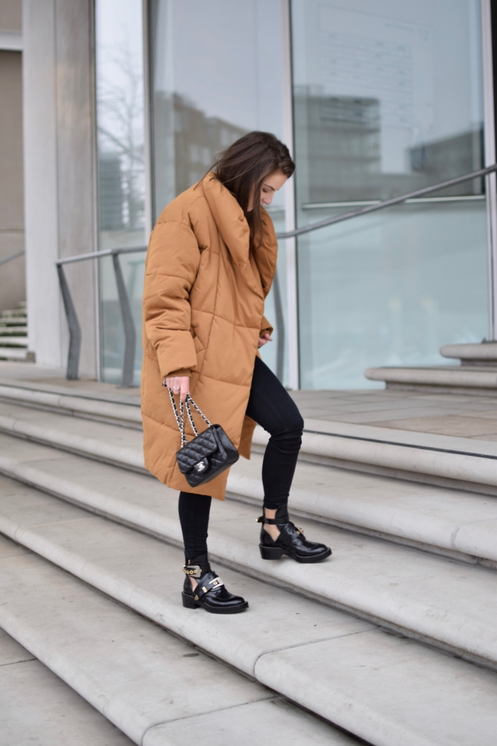 winter coat brown, black pants, black leather boots