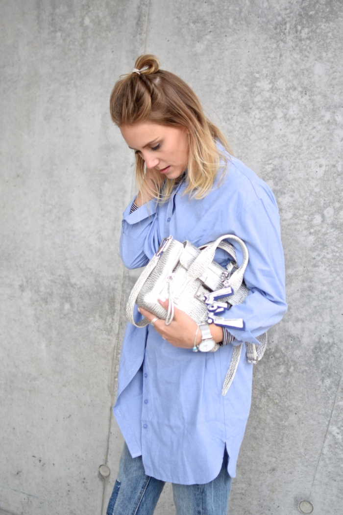 baby blue blouse, silver bag, silver watch