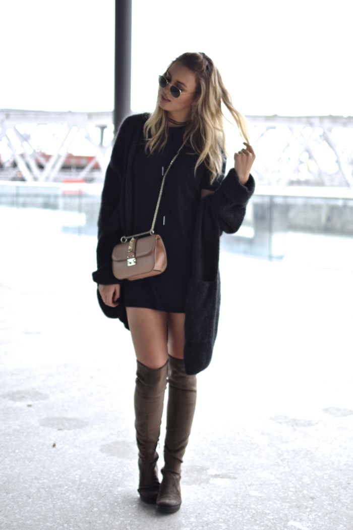 blonde, black outfit, brown overknees, nude bag