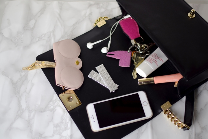 inside my bag, flatlay, cell phone, key ring, chewing gum, lotion