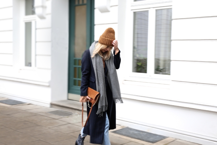 long coat, jeans, grey scarf, brown bag