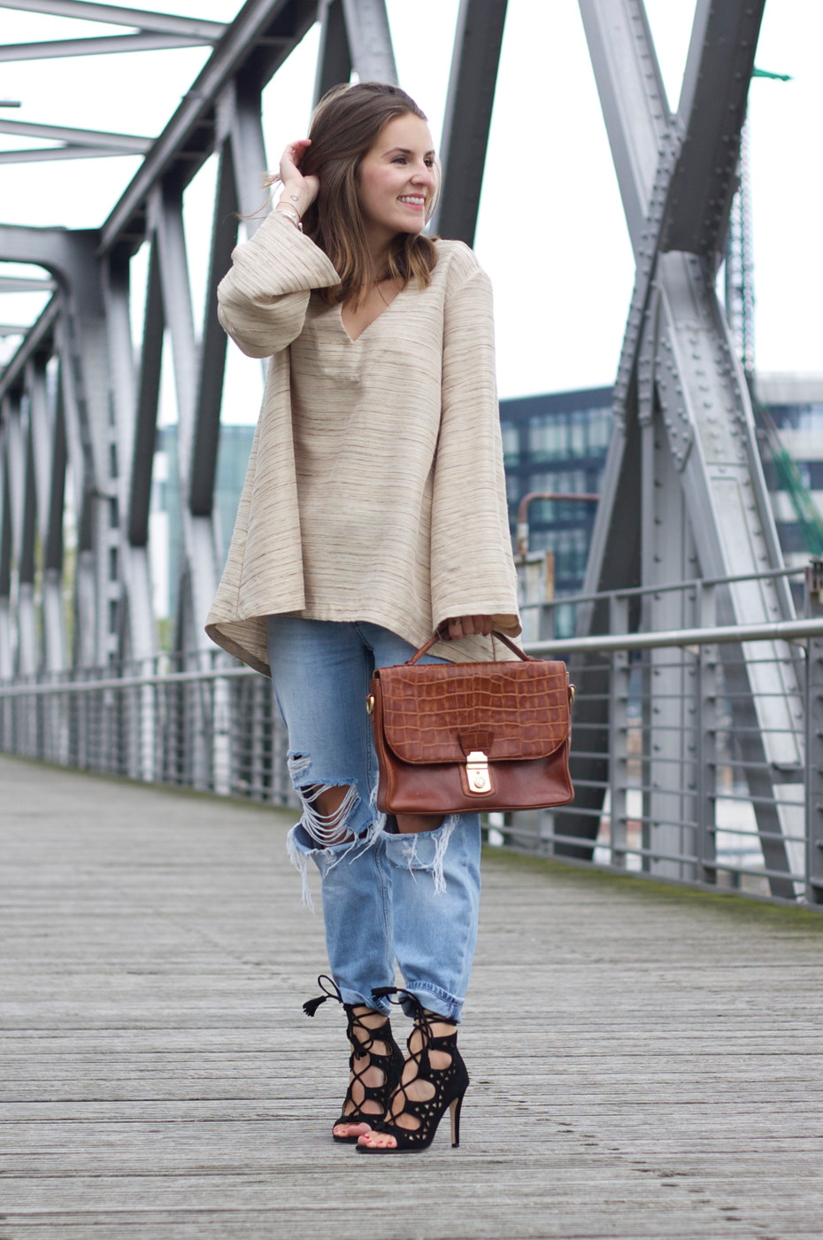 Laced Up Heels And Ripped Jeans - Shoppisticated