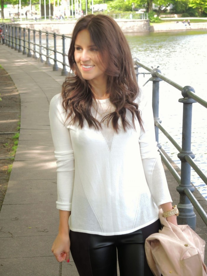 White pullover by Hugo Boss combined with black pants by Zara