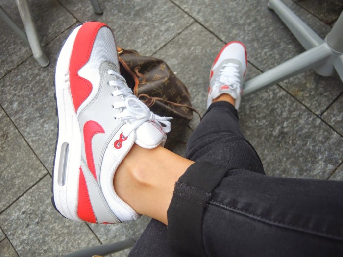 white red sneakers by Nike