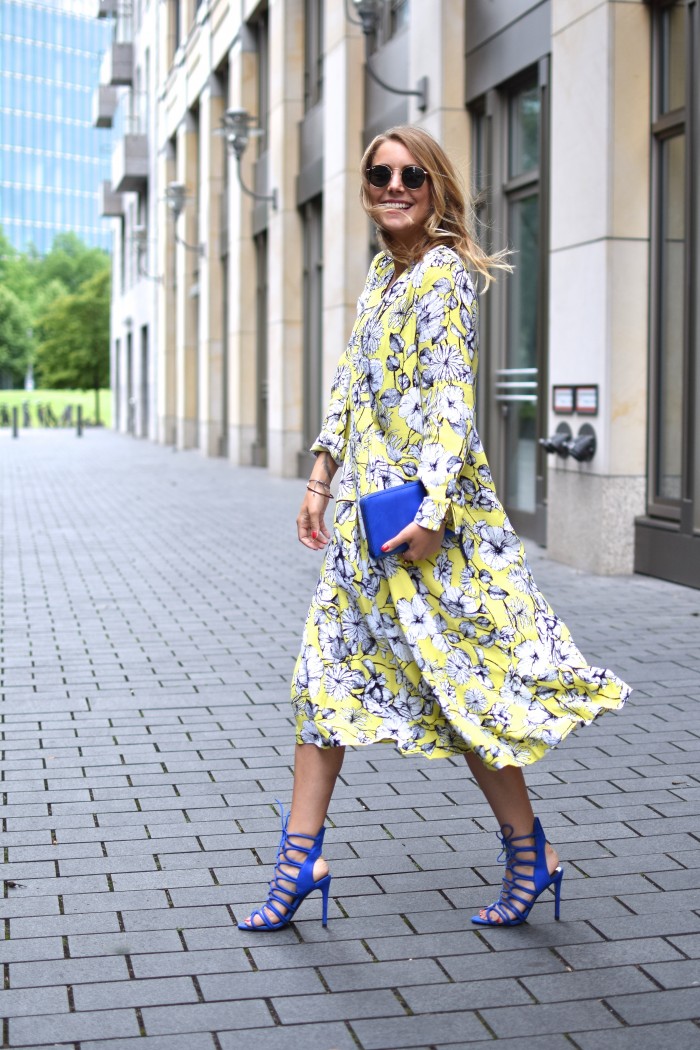 smiling girl with yellow summer dress