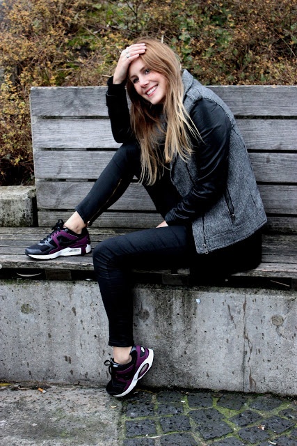 Grau schwarze Jacke und schwarze Hose