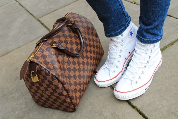 brown bag by louis vuitton and white sneaker by converse